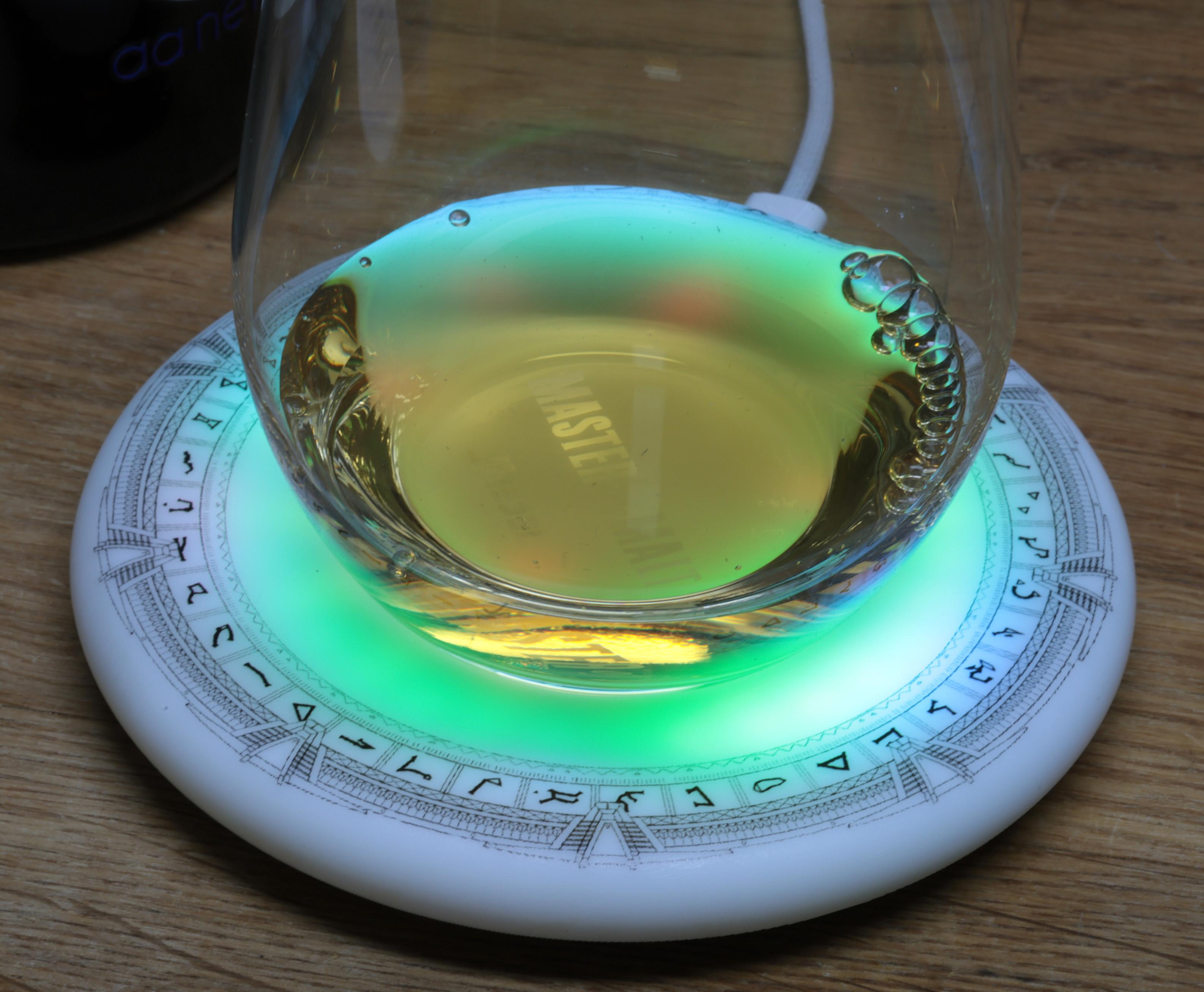 Stargate on LED coaster with whisky glass.
